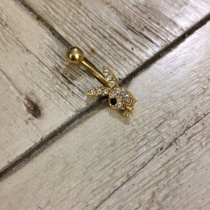 Playboy belly ring